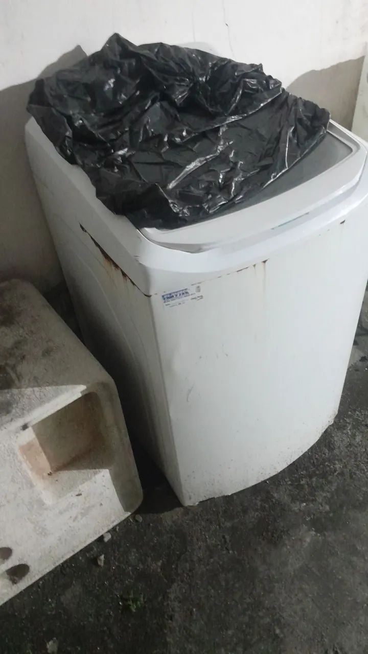 Máquina de lavar com defeito