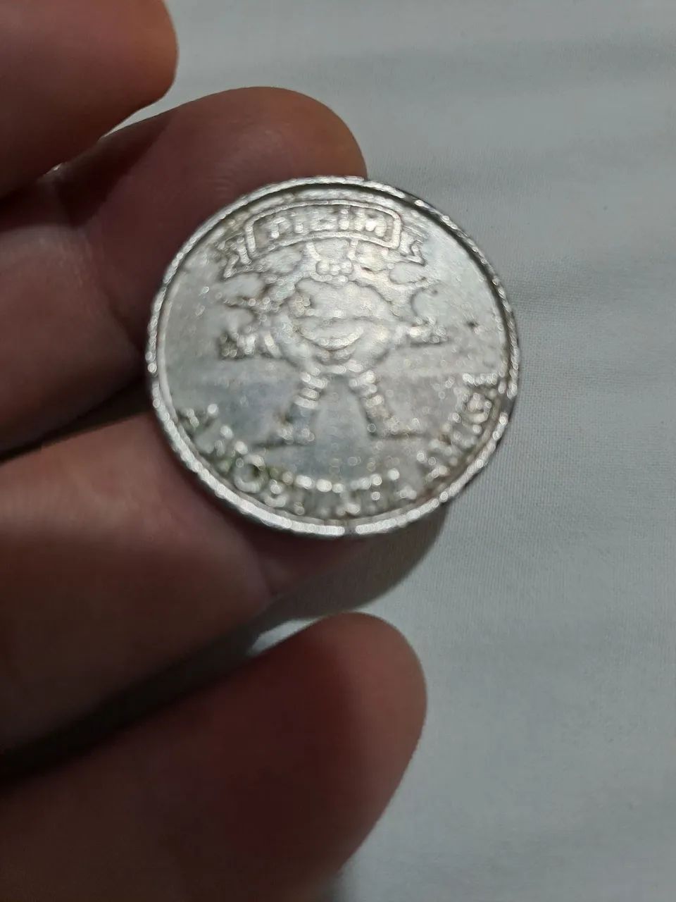 Moedinha medalha tilim da caixa 1970