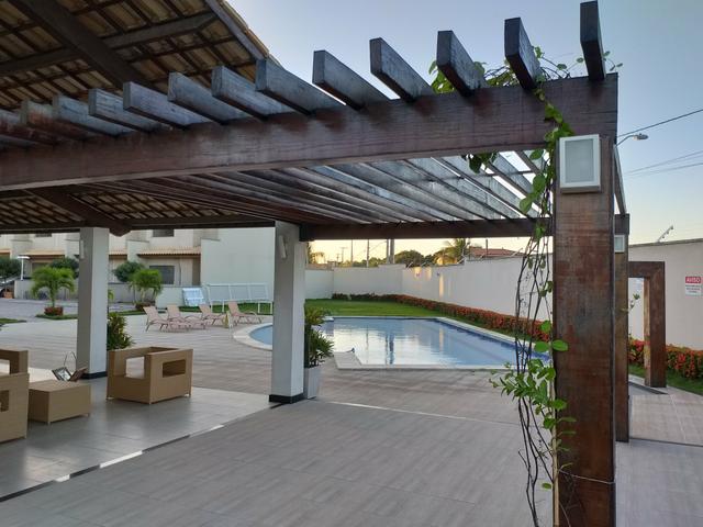 Linda casa em condomínio com ótima localização - Foto 17