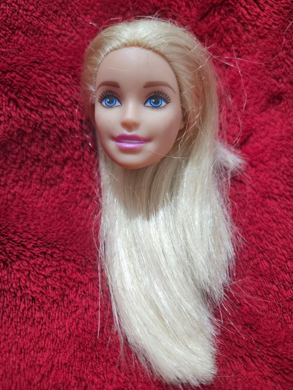 Cabeça de boneca barbie
