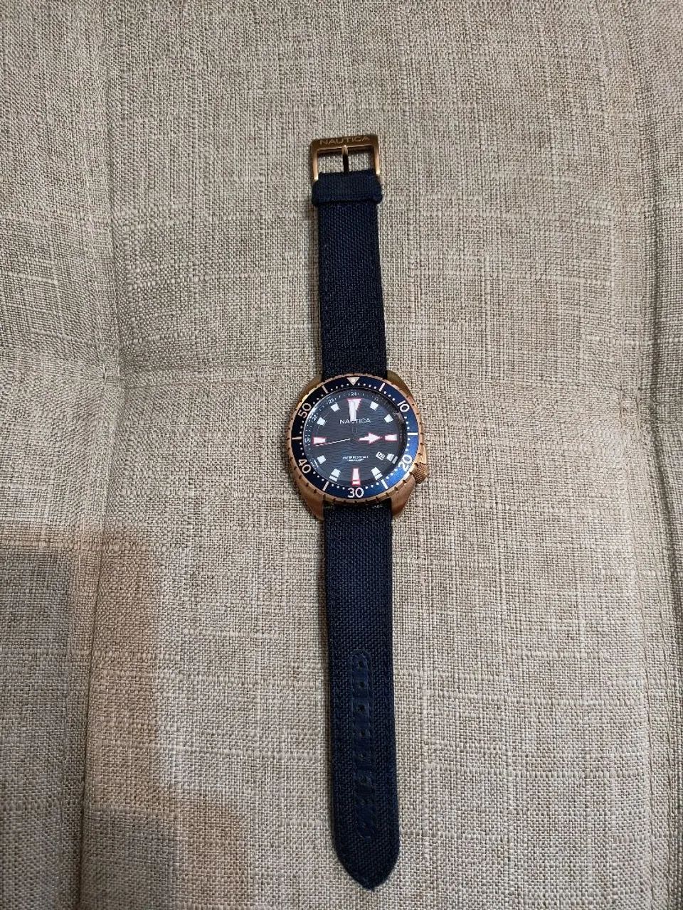 Relógio Nautica dourado fundo azul, pulseira nylon/couro.<br><br> - Foto 2