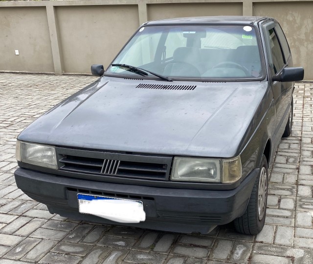FIAT UNO MILLE EX COM AR CONDICIONADO E GNV 2000