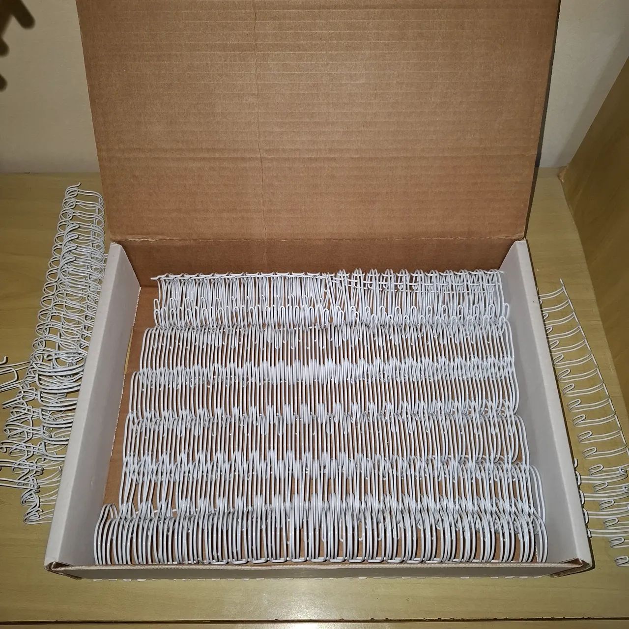 Vendo espirais para encadernação dupla64672973761665120