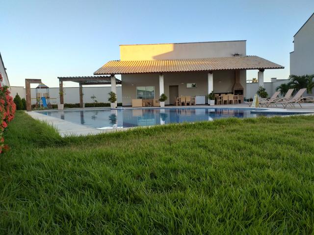 Linda casa em condomínio com ótima localização - Foto 11
