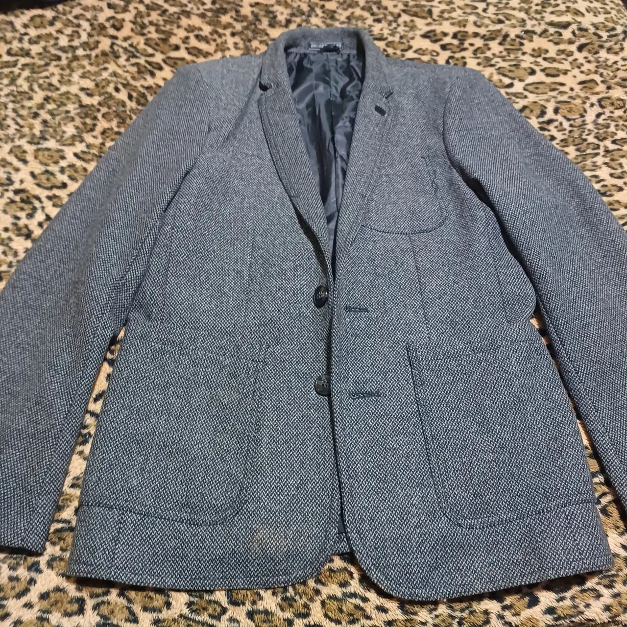 Blazer cinza de tecido texturizado