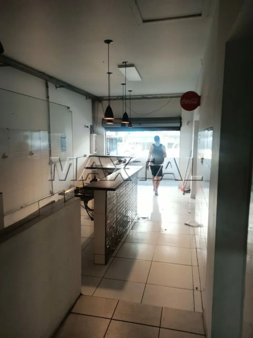 Loja com 100m² de área construída, salão amplo, copa, cozinha e 2 banheiros. - Foto 4