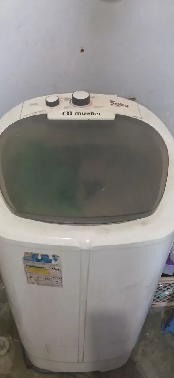 Máquina de lavar com defeito 