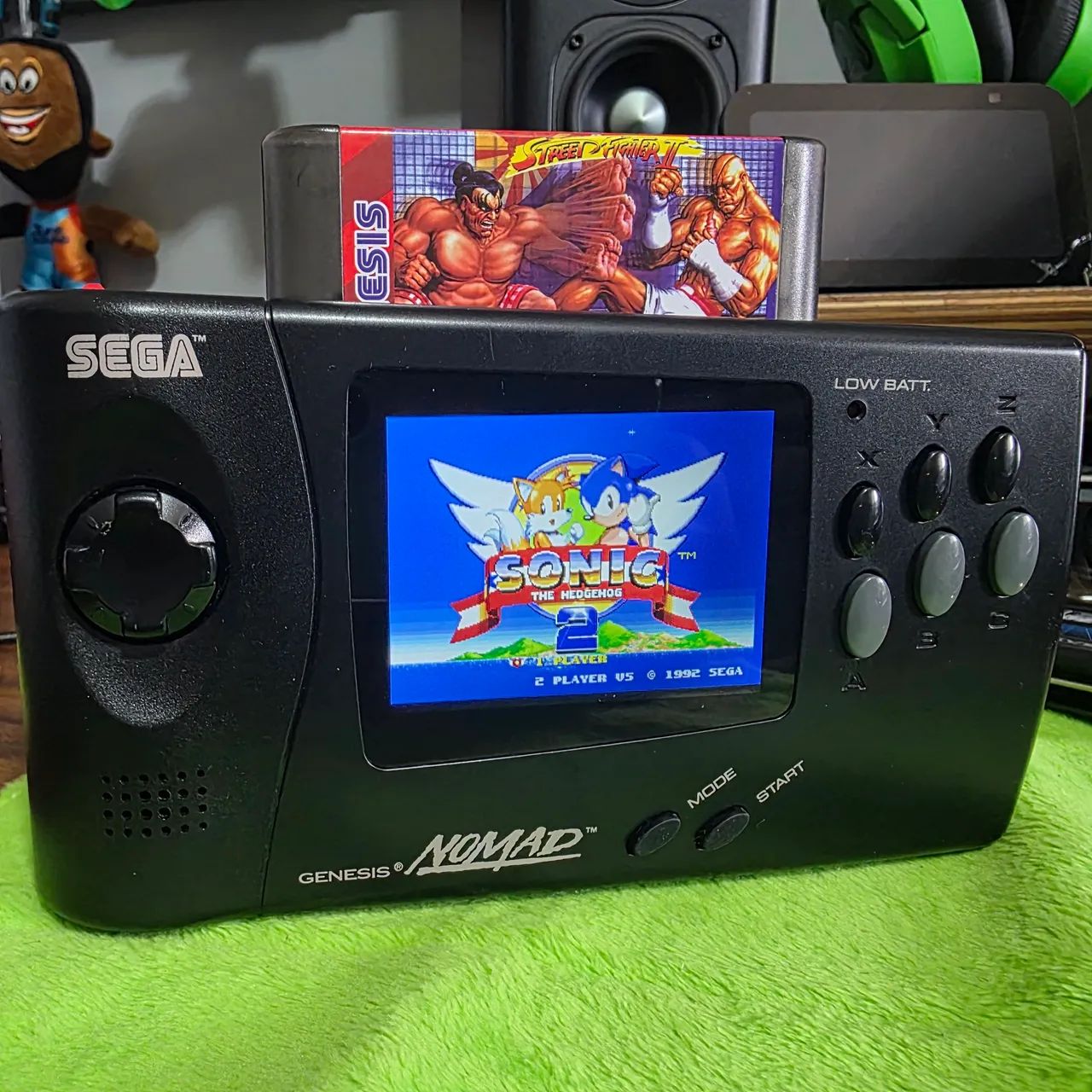 Sega Gênesis Nomad + PAC de bateria e Everdrive