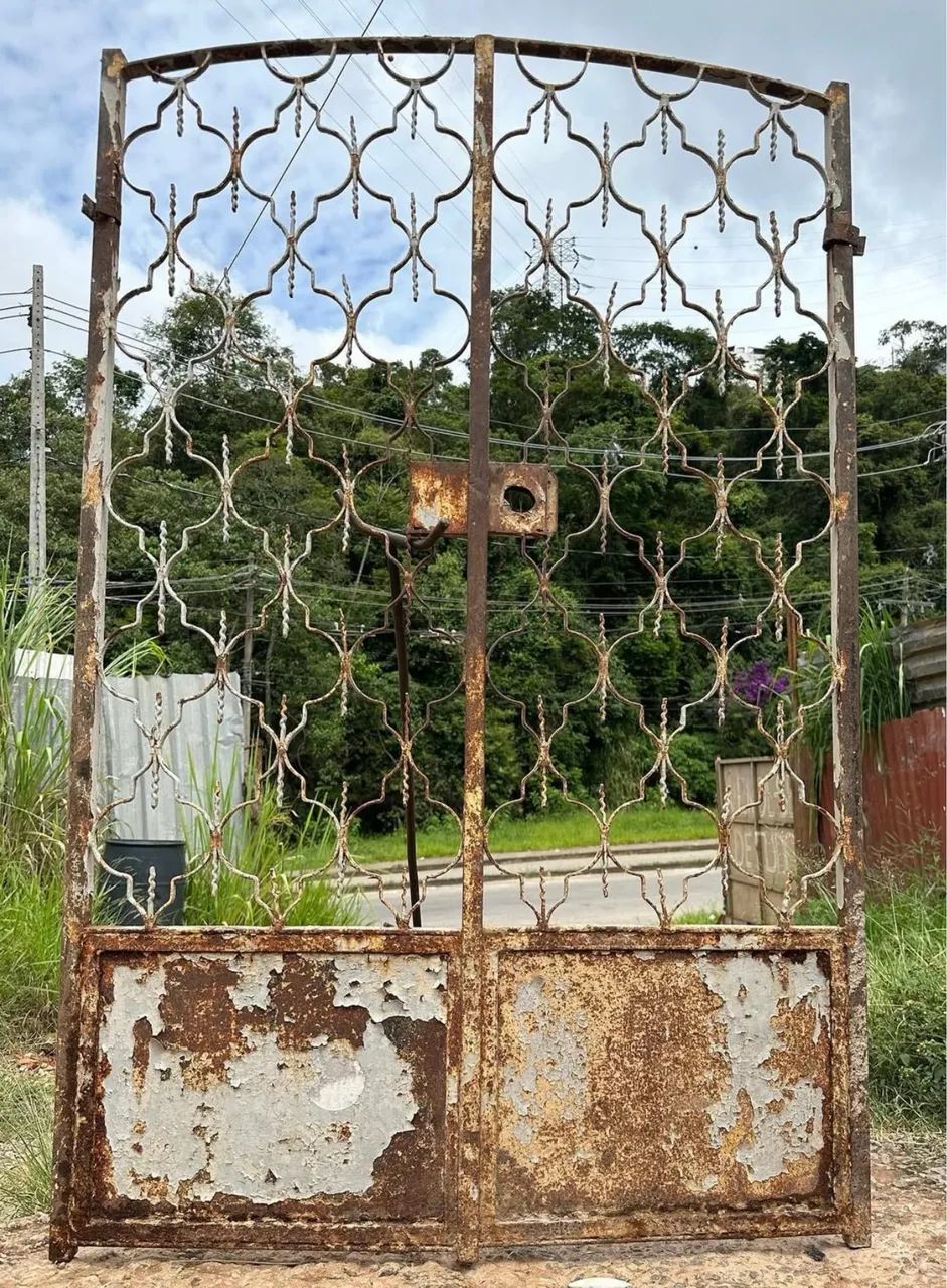 Ancient solid iron gate with two flags461932532219914240