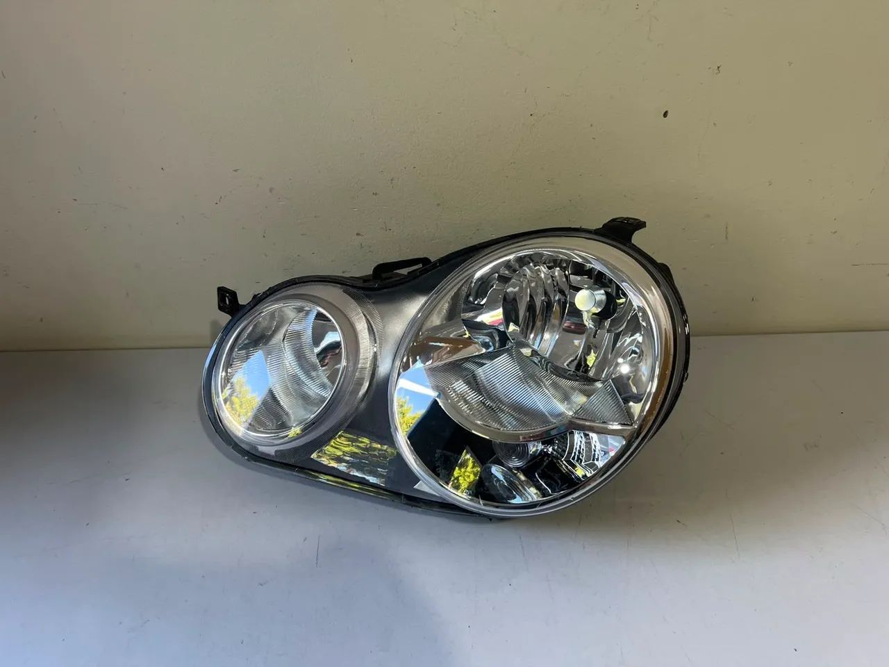 Farol esquerdo Polo 2003/2004/2005/2006