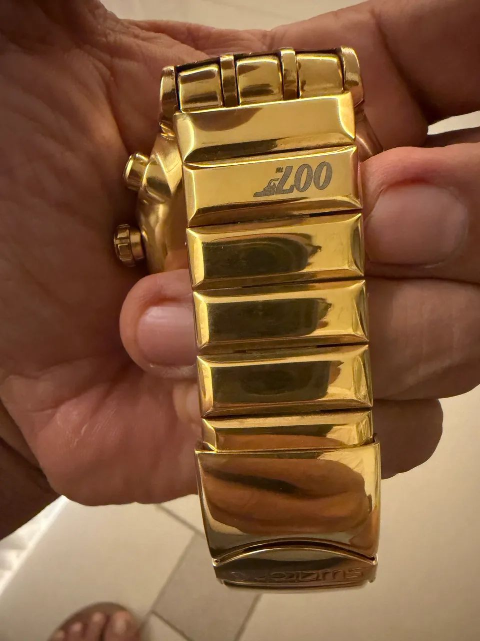Swatch 007 dourado original  - Foto 5