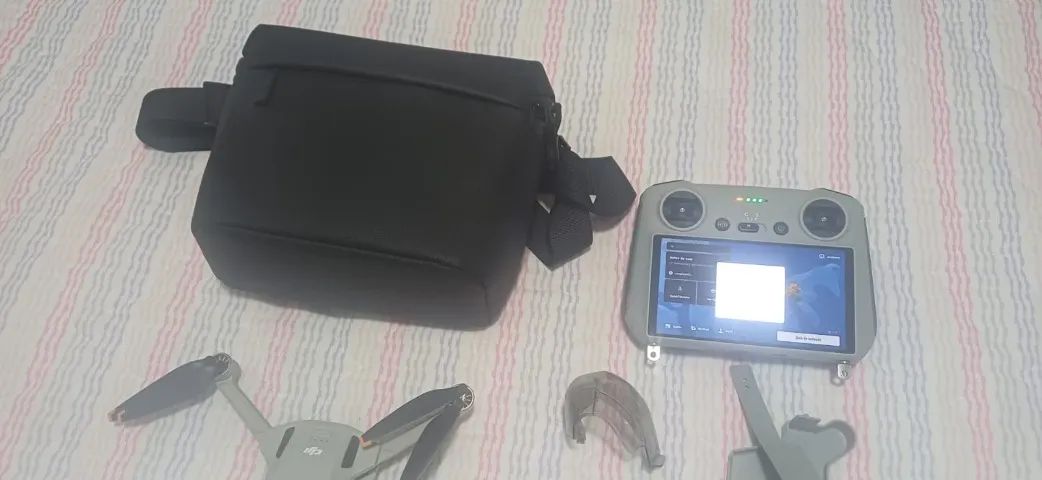 Dji mini 3 com tela e kit Fly More   - Foto 3