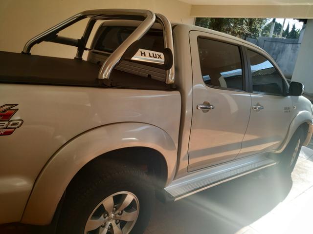 Hilux srv ano 2010 /10 vendo ou troca por Hilux nova 2019. ou carro - Foto 2