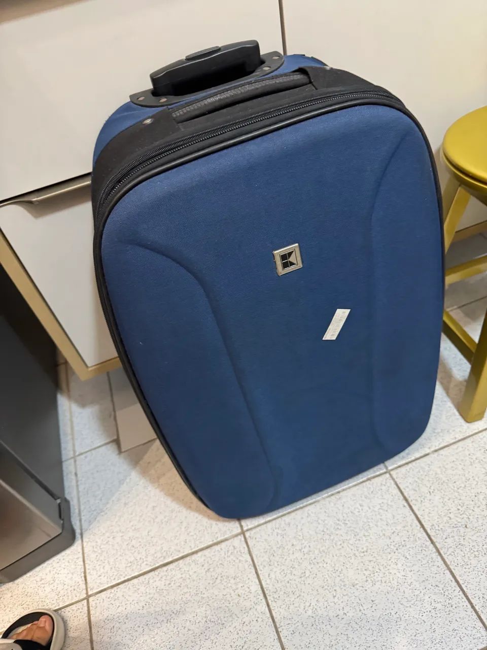 Mala azul de 23 kg