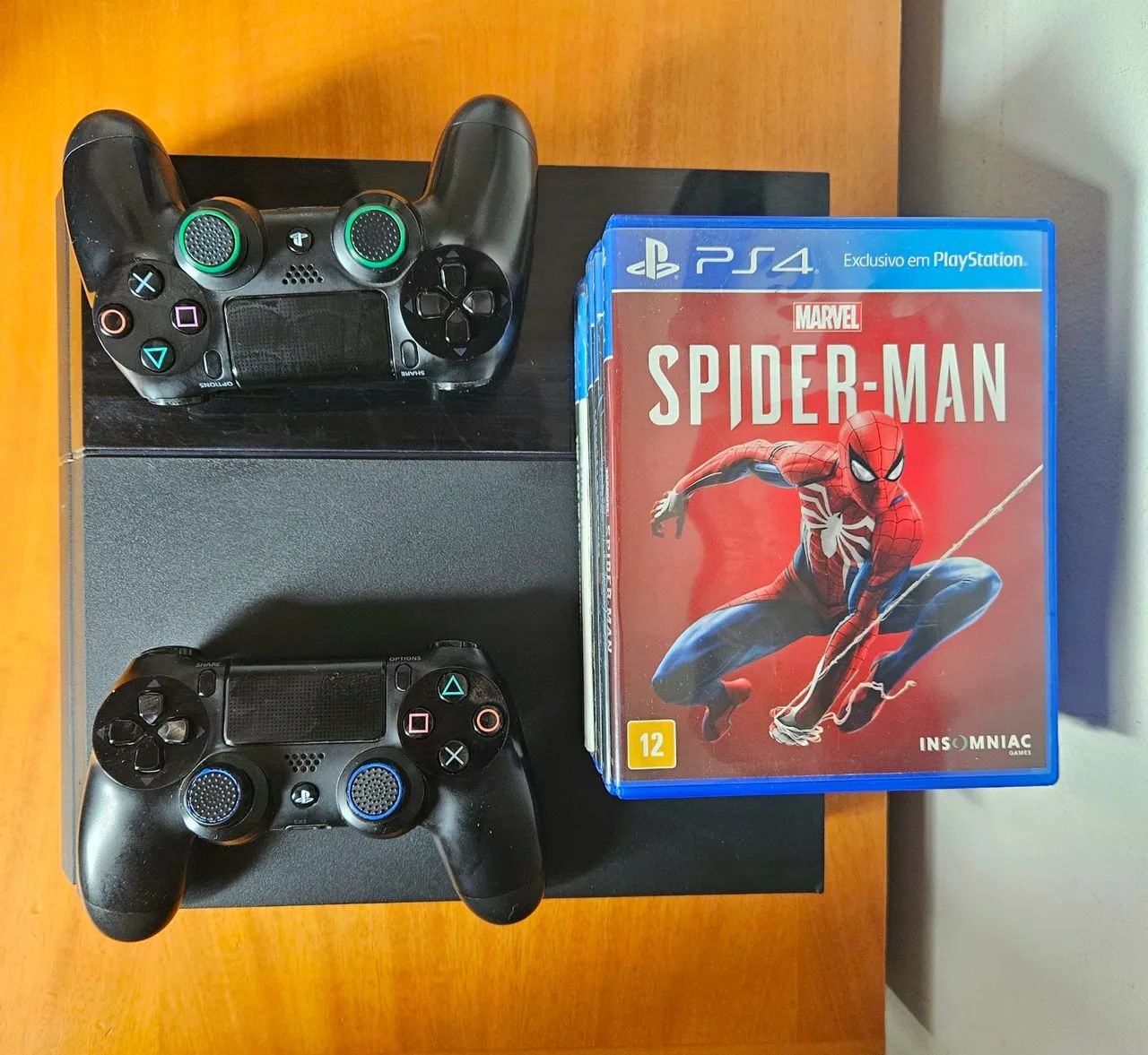PS4 with 2 controllers and 6 games