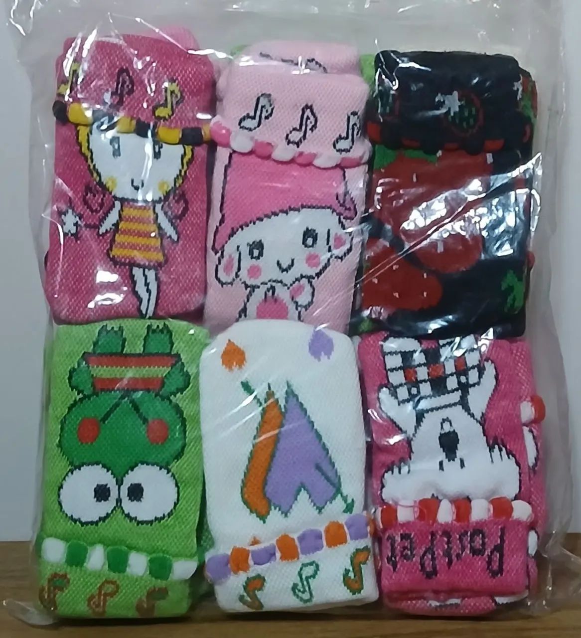 Lote com 120 mini bolsinhas porta celular retrô estampas variadas  - Foto 4