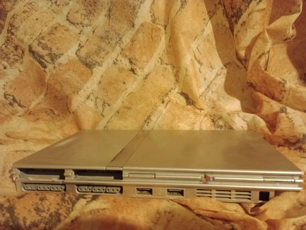 PlayStation 2 slim prata funcionando 