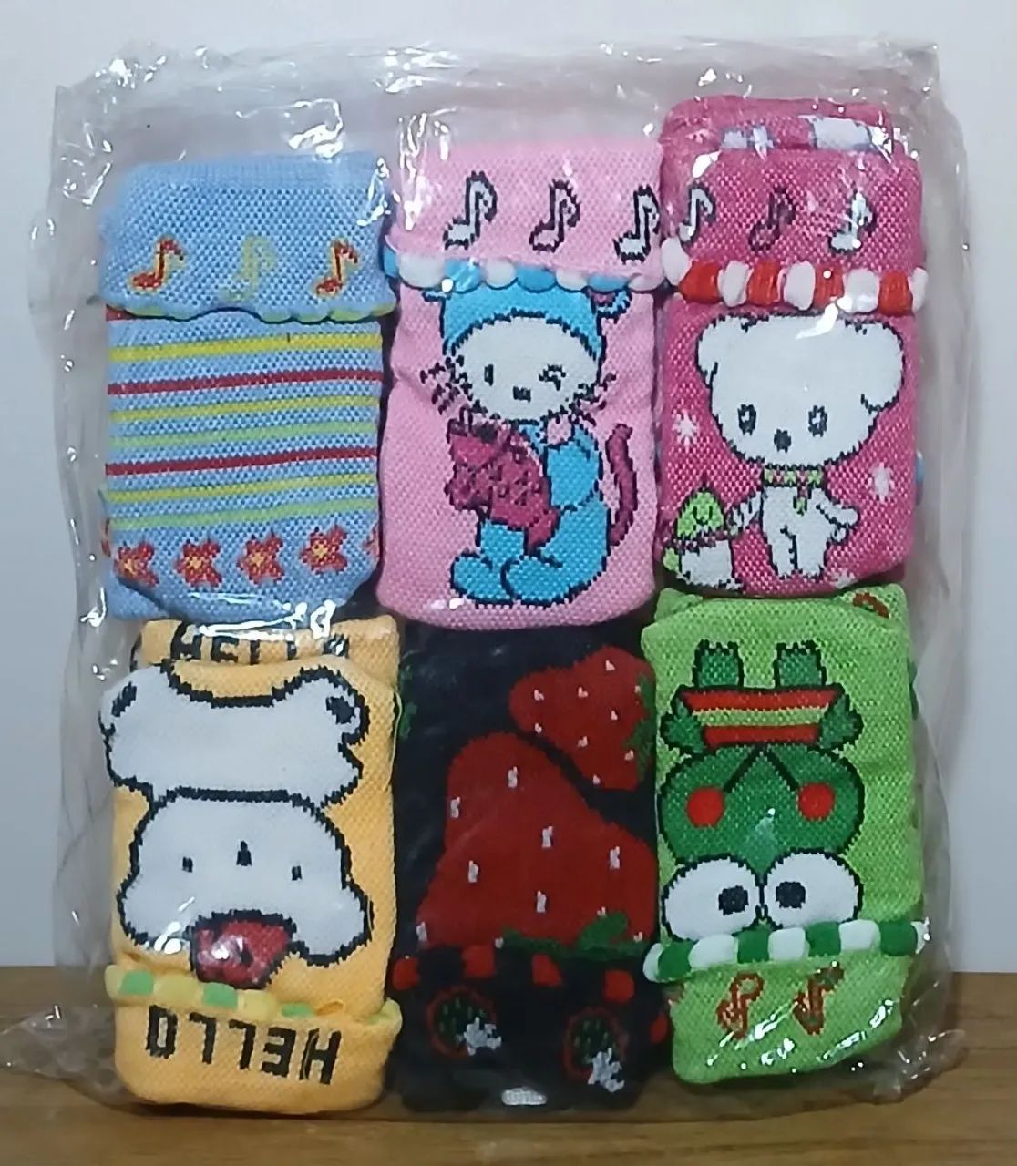 Lote com 120 mini bolsinhas porta celular retrô estampas variadas  - Foto 5