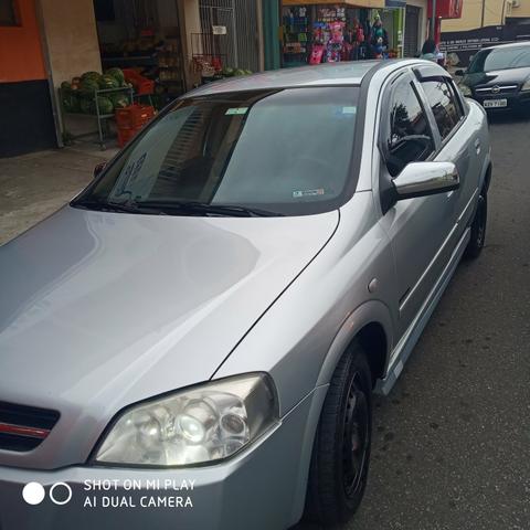 Vendo um astra sedan 2007 troco por spin