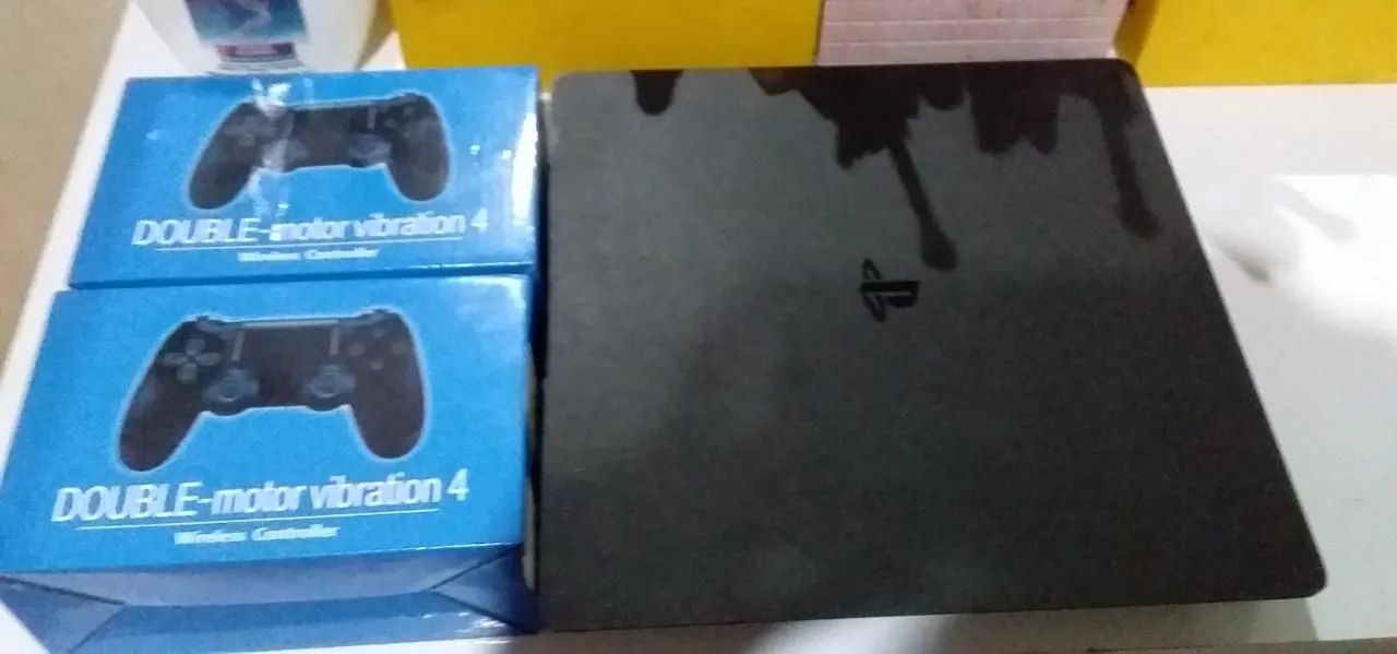 PS4 slim + dois controles novos na caixa+ vários jogos mídia digital na conta - Foto 2