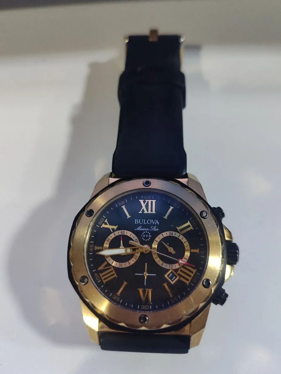 Relógio bulova marine Star dourado 