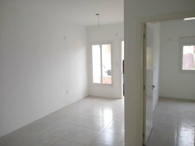 Casa geminada Sl 2 dorm - Foto 4