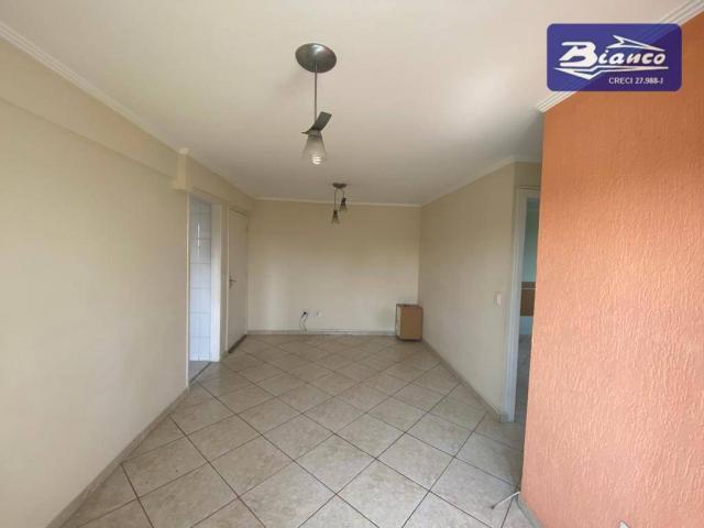 Apartamento com 2 dormitórios para alugar, 50 m² por R$ 900,00/mês - Vila Augusta - Guarul - Foto 2