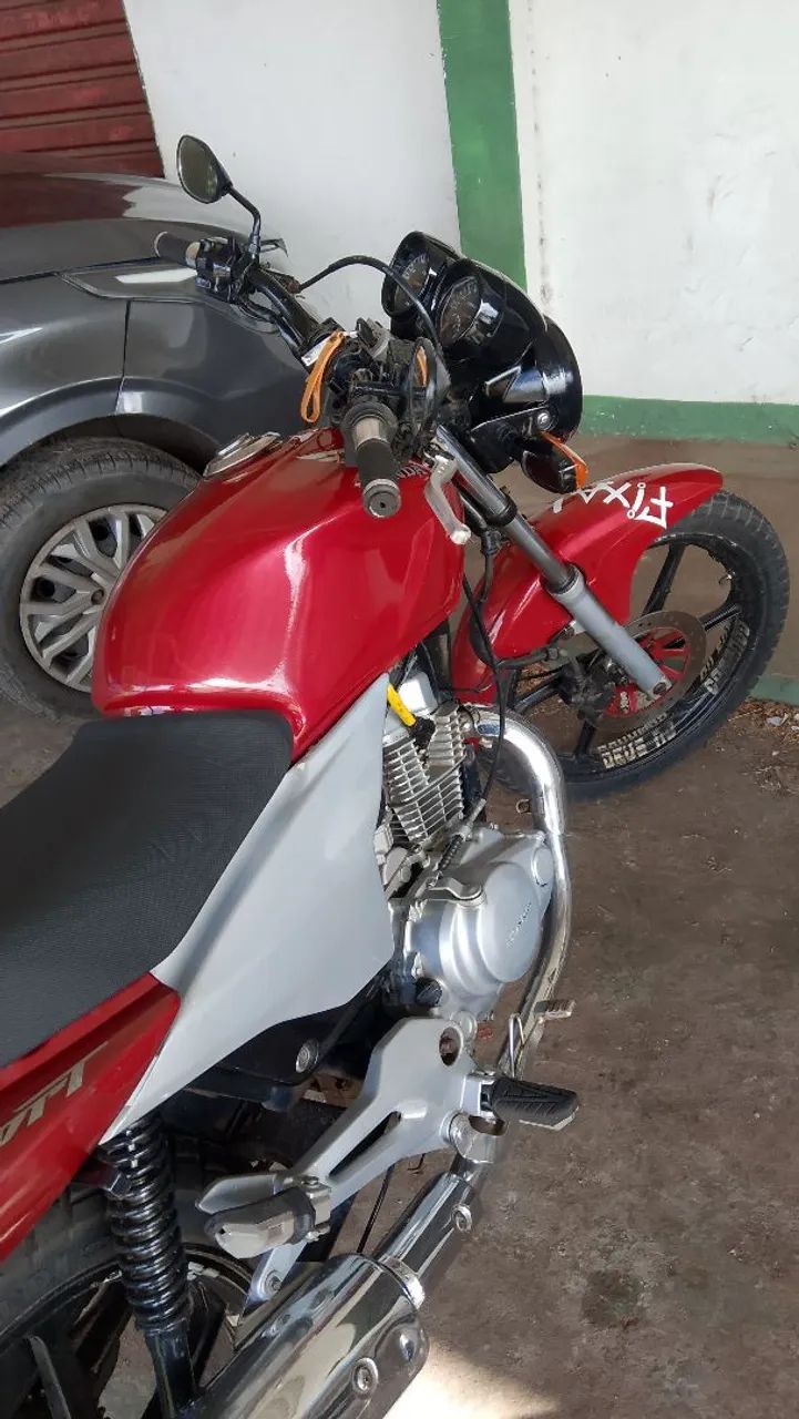 Sem multa , só documento atrasado.moto tá filé.so pegar e andar,ou troca em carro . - Foto 2