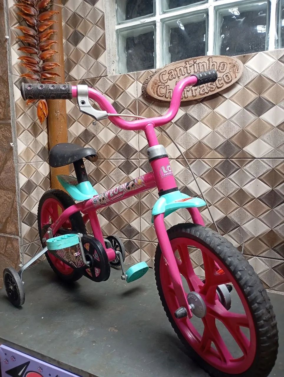 Bicicleta infantil com rodinha da lol
