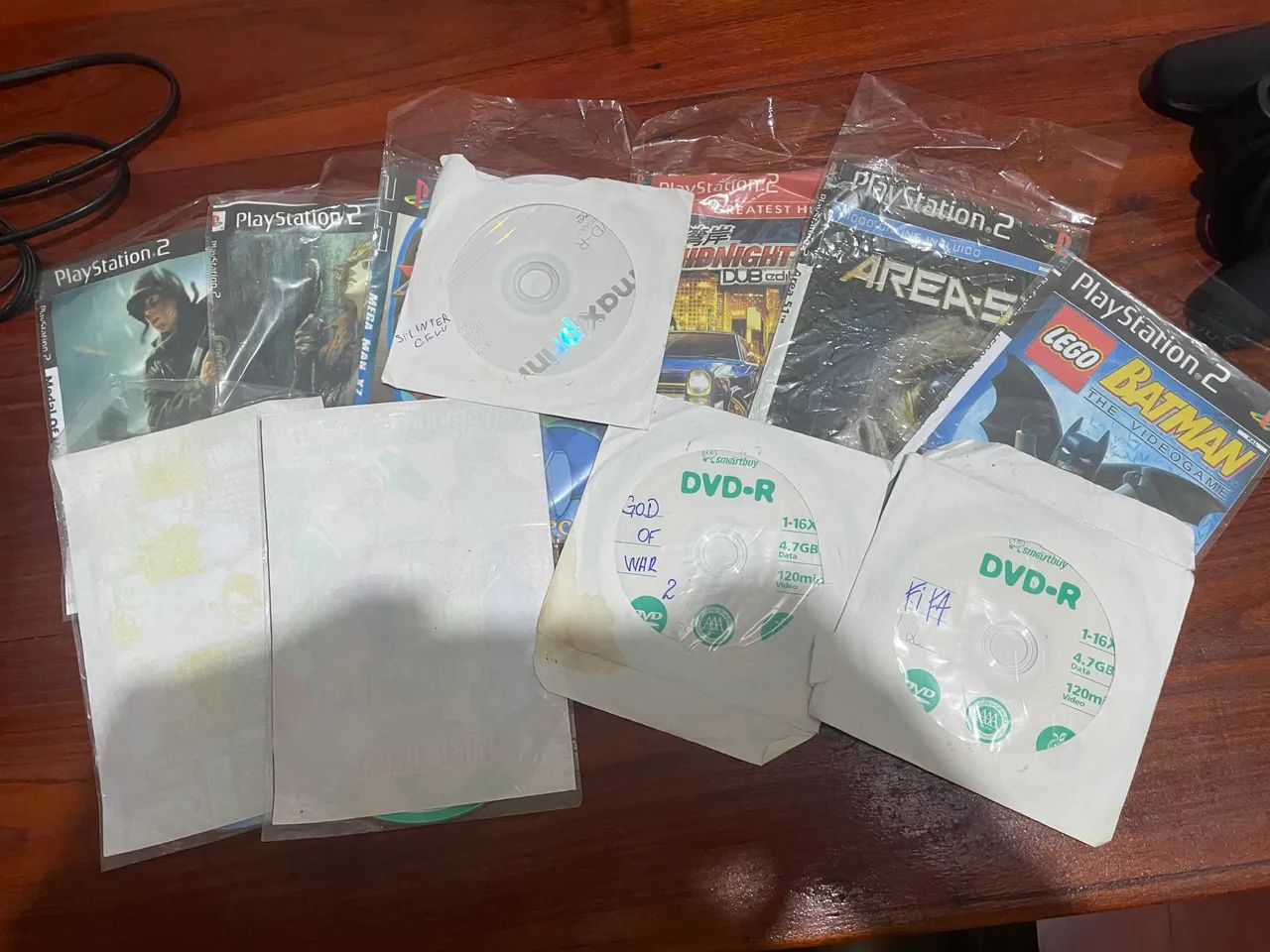 Ps2 em bom estado com 2 controles 1 memory card 16mb e 11 jogos - Foto 4