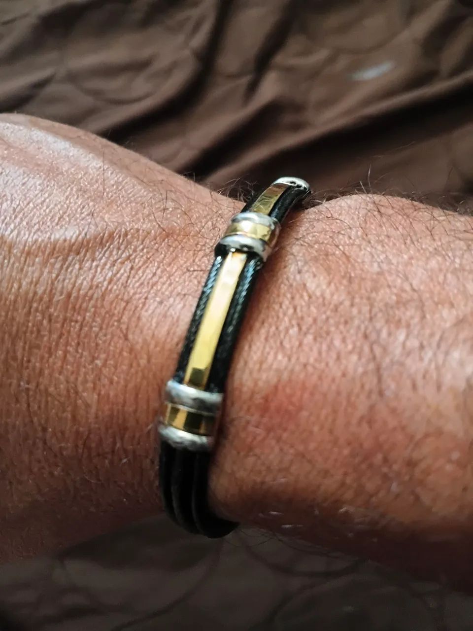 Bracelete aço com ouro