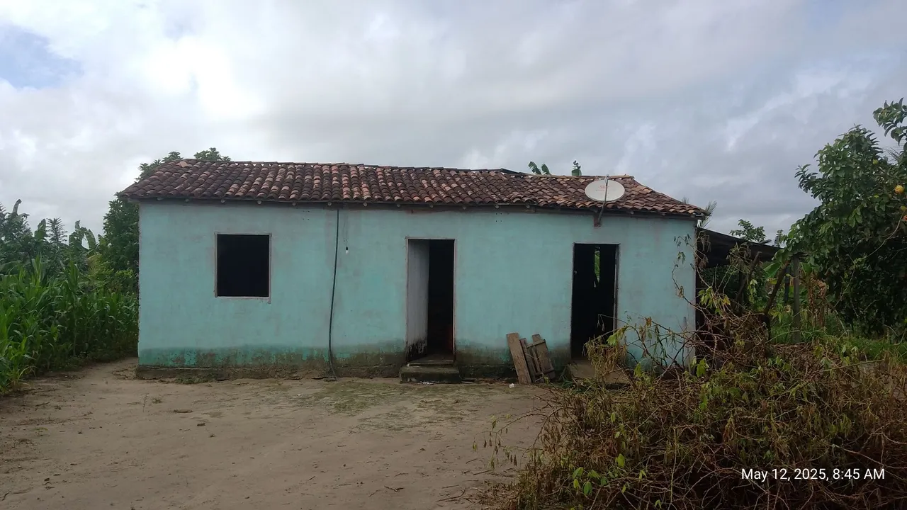 Terreno com casa