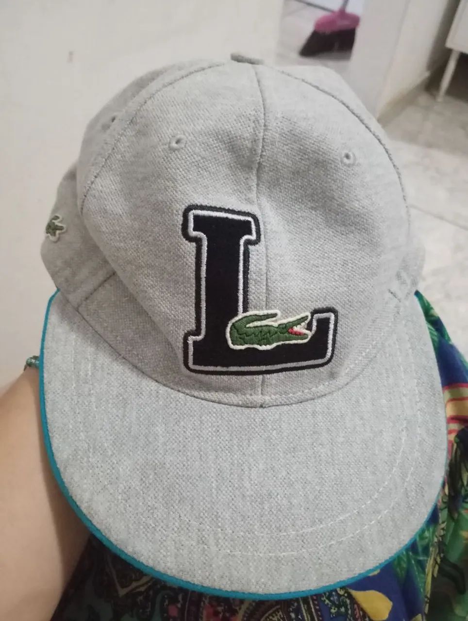 Boné Lacoste sport  em perfeito  estado.