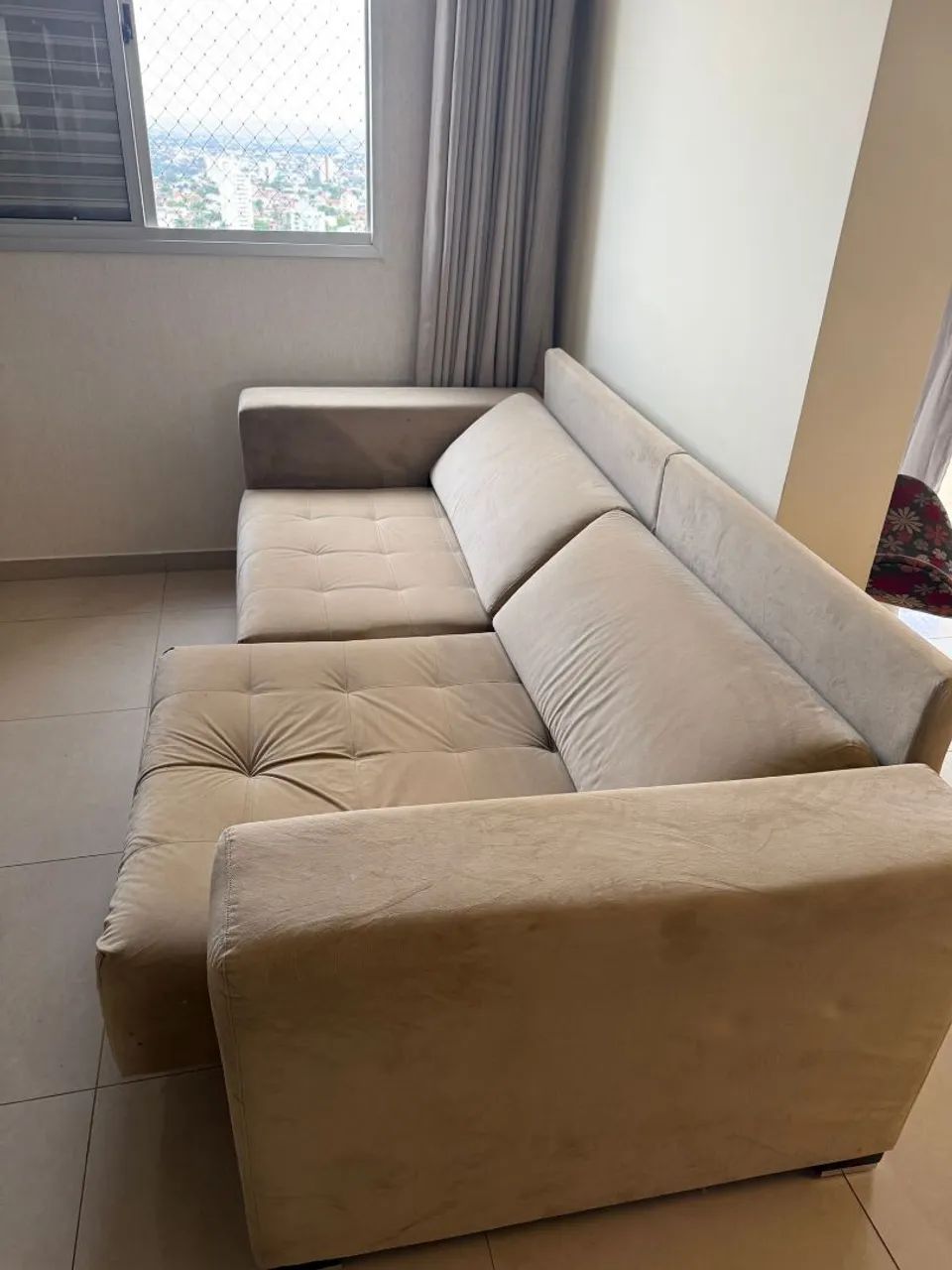 Sofá retrátil em muito bom estado,600 Reais.