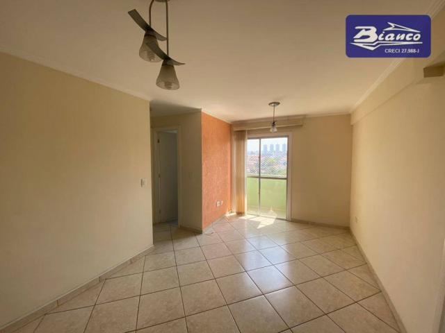 Apartamento com 2 dormitórios para alugar, 50 m² por R$ 900,00/mês - Vila Augusta - Guarul