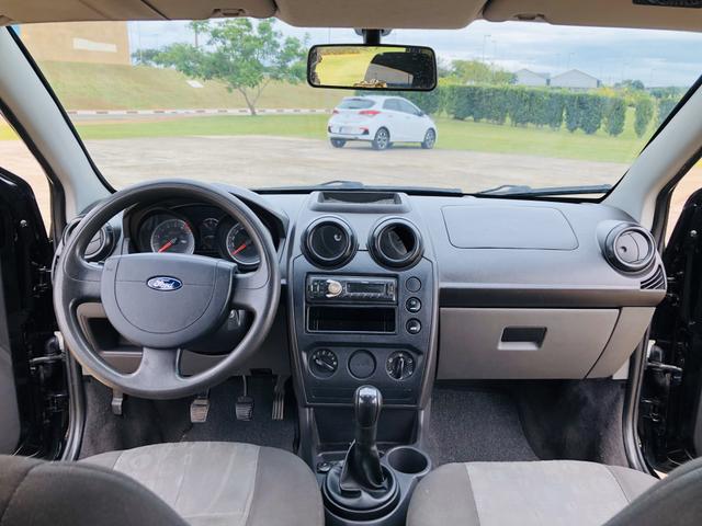 Ford Fiesta 1.0 8v flex 2011 Vendo, troco e financio - Foto 7