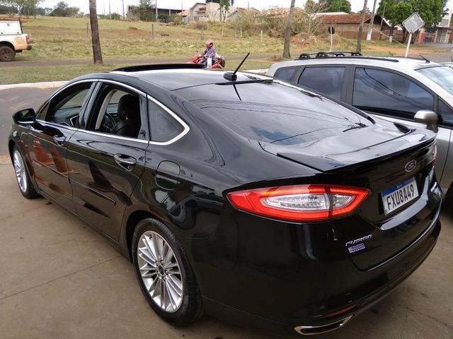 Ford fusion troco por Hilux - Foto 2