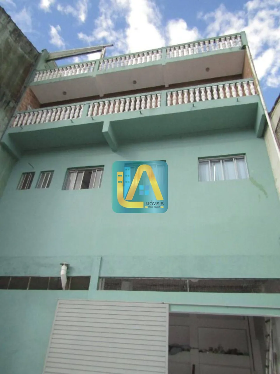 Prédio com 02 SALÕES e CASA de 03 dormitórios no Centro de Riacho Grande - R$ 900.000,00