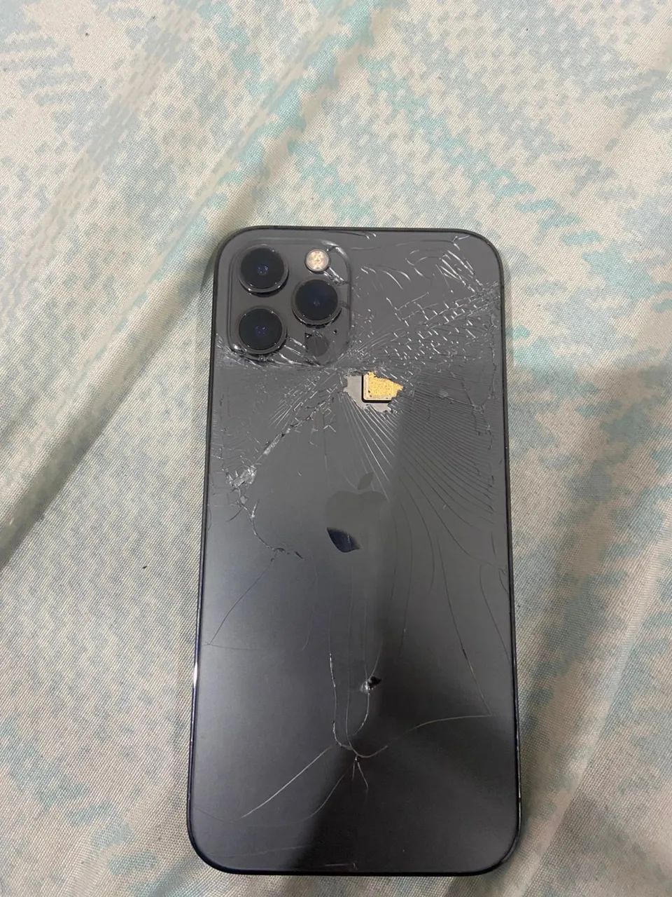 IPHONE 12 PRO TRASEIRA QUEBRADA