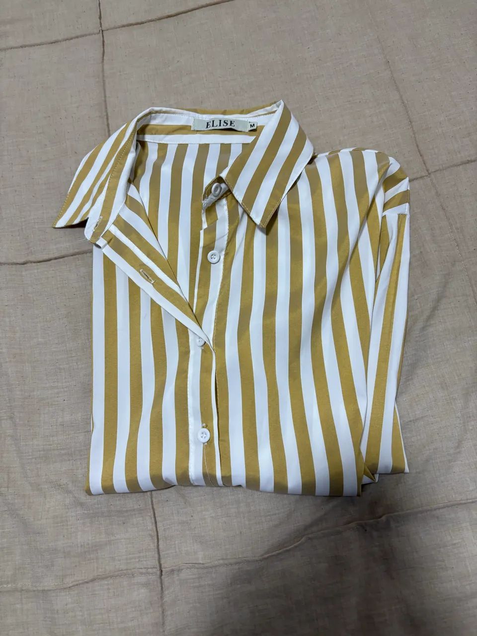 Blusa manga longa listrada 