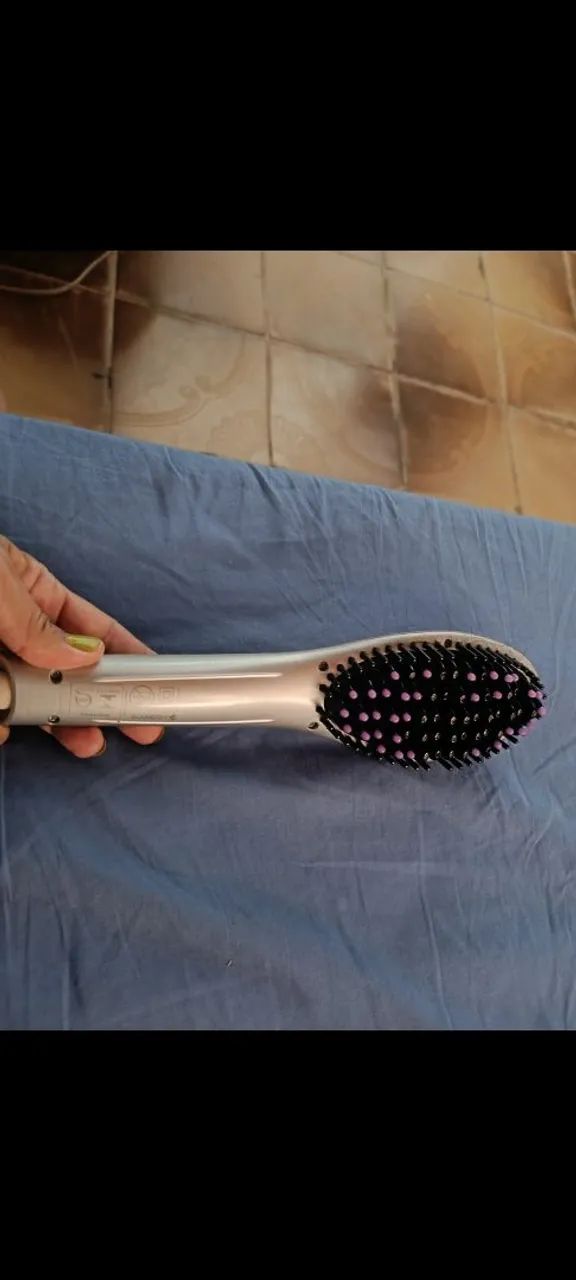 Escova alisadora usada