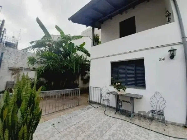 Casa 4 dormitórios para alugar Menino Deus Porto Alegre/RS