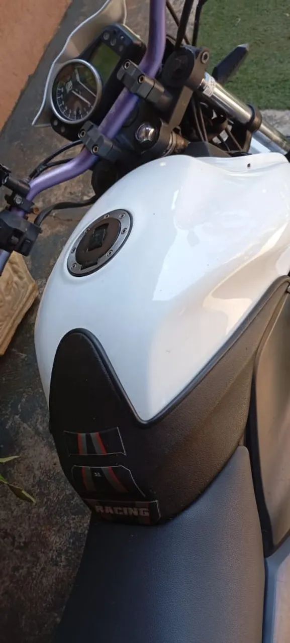next 250 com acessórios 