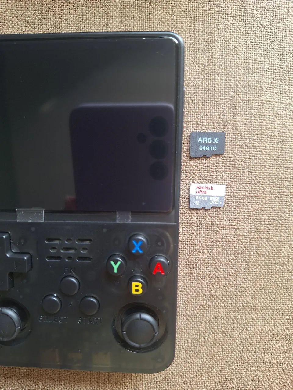 Console R36S com cartão SanDisk 64Gb - Foto 2