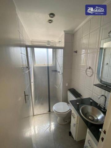 Apartamento com 2 dormitórios para alugar, 50 m² por R$ 900,00/mês - Vila Augusta - Guarul - Foto 9