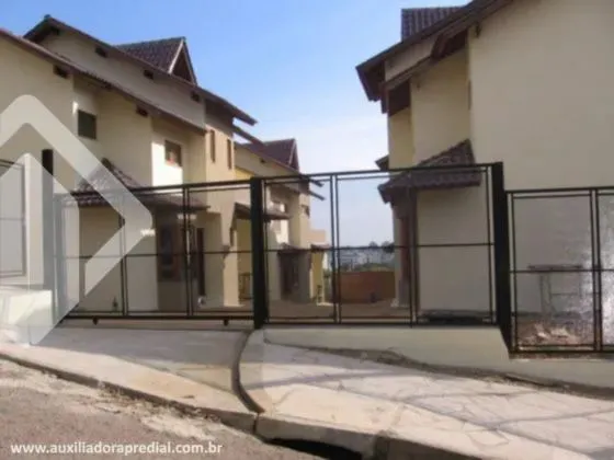 Casa de condomínio à venda no bairro Tristeza com 148 m² e 3 dormitórios/quartos
