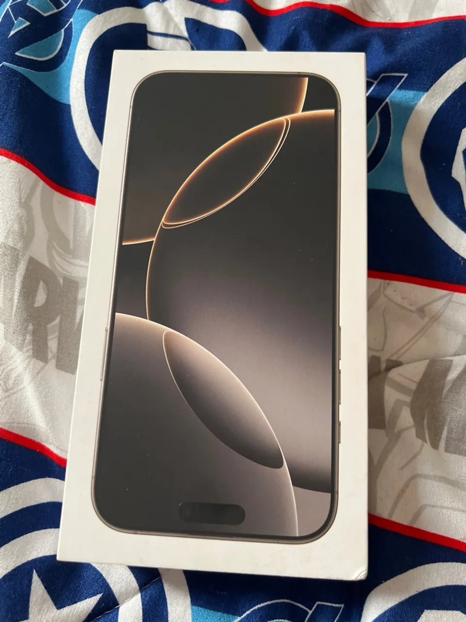 iPhone 16 Pro Max na caixa com nota fiscal