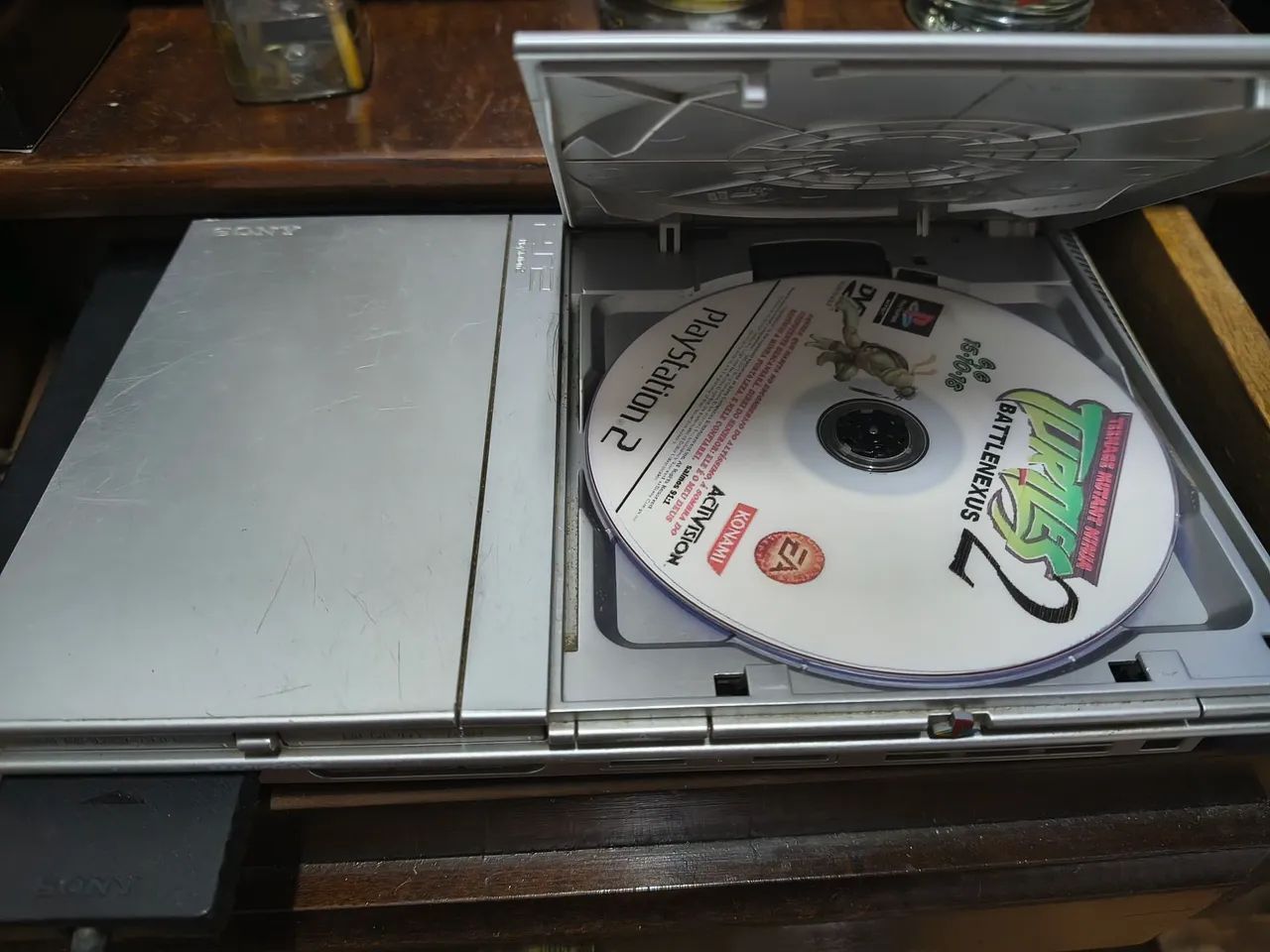 PS2 prateado, controle original - Foto 4