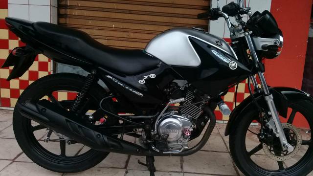 Vendo moto factor 2009 aro de liga leve e pedal toda em dias com Dit e dual em mãos
