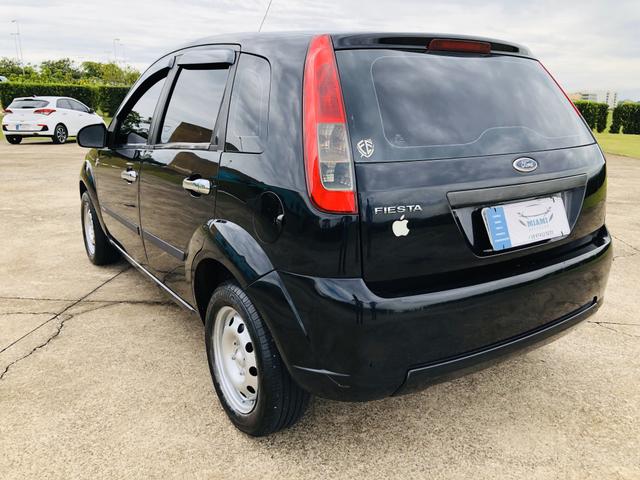 Ford Fiesta 1.0 8v flex 2011 Vendo, troco e financio - Foto 5